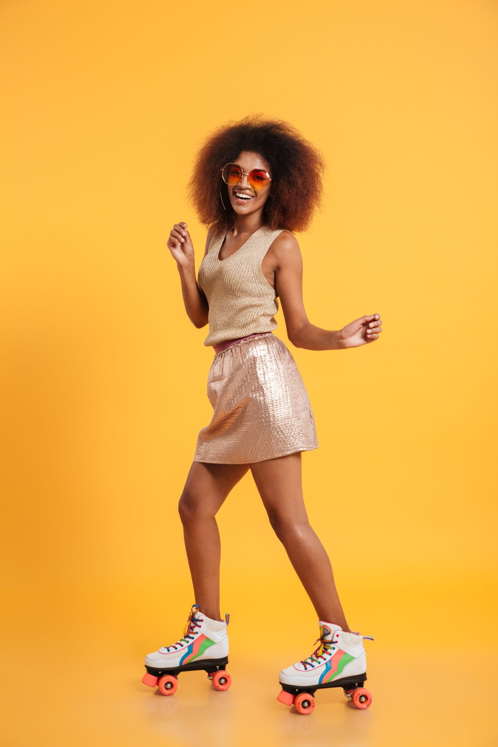 Full length portrait of a cheerful afro american woman